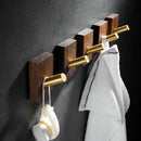 Modern wood and brushed gold wall hook row for kitchen by Decorbites