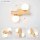 GobekUsa Nordic White Glass Ball Rotating Wall Lamp with Wood Wall Mount - Ideal for Bedroom Lighting