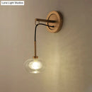GobekUsa Modernist Oval Amber/White Glass Sconce with Brass Finish - Wall Mounted 1-Light Drop Lamp