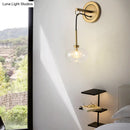 GobekUsa Modernist Oval Amber/White Glass Sconce with Brass Finish - Wall Mounted 1-Light Drop Lamp