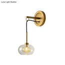 GobekUsa Modernist Oval Amber/White Glass Sconce with Brass Finish - Wall Mounted 1-Light Drop Lamp