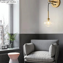 GobekUsa Modernist Oval Amber/White Glass Sconce with Brass Finish - Wall Mounted 1-Light Drop Lamp