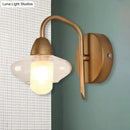 GobekUsa Modernist Brass Elliptical LED Wall Sconce – Clear Glass, 1-Light