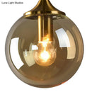 GobekUsa Modernist Glass Round Sconce Lamp: 1-Light Wall Mounted Light in Gold for Living Room