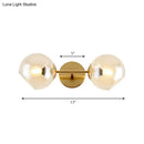 GobekUsa Modernist Gold Wall Lamp with Clear Glass Shade - 2 Lights Spherical Mount Fixture
