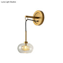 GobekUsa Modernist Oval Amber/White Glass Sconce with Brass Finish - Wall Mounted 1-Light Drop Lamp