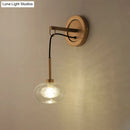 GobekUsa Modernist Oval Amber/White Glass Sconce with Brass Finish - Wall Mounted 1-Light Drop Lamp
