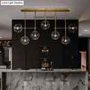 GobekUsa Nordic Clear Glass 7-Bulb Black/Gold Sphere Island Pendant Light for Living Room
