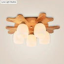 GobekUsa Nordic Cream Glass Bell Flush Ceiling Light with Antler Top and Wood Accents