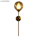 GobekUsa Nordic Glass Wall Light: Ball Shaped Sconce with Brass Pencil Arm