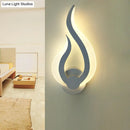 GobekUsa Nordic LED Flame-Shaped Wall Sconce Light for Cozy Bedroom Ambiance in Warm/White