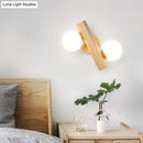 GobekUsa Nordic White Glass Ball Rotating Wall Lamp with Wood Wall Mount - Ideal for Bedroom Lighting