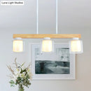 GobekUsa Nordic Wooden Linear Pendant with Double Glass Cylinder Shades for Restaurant Island Lighting (3/4-Head, White)