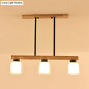 GobekUsa Nordic Wooden Linear Pendant with Double Glass Cylinder Shades for Restaurant Island Lighting (3/4-Head, White)