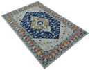 Ollie Traditional Blue And Ivory Hand Tufted Wool Rug