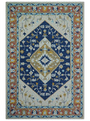 Ollie Traditional Blue And Ivory Hand Tufted Wool Rug