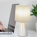 Orange ceramic milkshake bedside lamp with pleated shade for bedroom by Decorbites