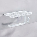 Ornate black metal toilet paper holder with phone shelf bathroom storage by Decorbites