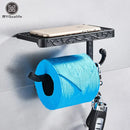 Ornate black metal toilet paper holder with phone shelf bathroom storage by Decorbites