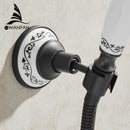 Ornate black & white ceramic handheld shower mount – bathroom accessory by Decorbites