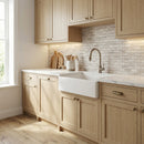 Modern kitchen with wooden cabinets, white countertop, and tiled backsplash.