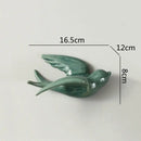 Pastel flying bird ceramic wall ornament living room decor by Decorbites