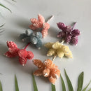 Pastel pinecone artificial flower wreath for living room decor by Decorbites