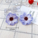 Pastel pink and lavender mini daisy artificial flowers wedding decor by Decorbites