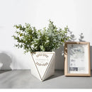 Peach & green eucalyptus leaves artificial arrangement living room vase by Decorbites