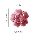 Pink and green ceramic sakura chopstick rest dining room decor by Decorbites