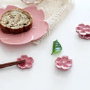 Pink and green ceramic sakura chopstick rest dining room decor by Decorbites