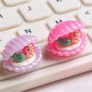 Pink and white mermaid colorful plated seashells bedroom decor by Decorbites