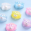 Pink and white mermaid colorful plated seashells bedroom decor by Decorbites