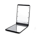 Pink & black led vanity mirror compact bedroom makeup tool by Decorbites