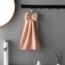 Plush coral velvet soft hand towels with bows for kitchen and bathroom by Decorbites