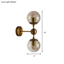 GobekUsa Post Modern Amber Glass Globe Wall Sconce with Brass Mount - 1/2 Light