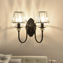 GobekUsa Post-Modern Black Metal Wall Mount Light with Clear Crystal Shade - Trapezoid/Flower/Drum Design