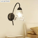 GobekUsa Post-Modern Black Metal Wall Mount Light with Clear Crystal Shade - Trapezoid/Flower/Drum Design