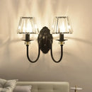 GobekUsa Post-Modern Black Metal Wall Mount Light with Clear Crystal Shade - Trapezoid/Flower/Drum Design