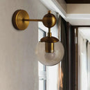 GobekUsa Post Modern Amber Glass Globe Wall Sconce with Brass Mount - 1/2 Light