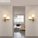 GobekUsa Post-Modern White Glass Sphere Wall Sconce with Brass Finish - 1/2 Bulbs