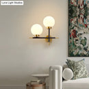 GobekUsa Post-Modern White Glass Sphere Wall Sconce with Brass Finish - 1/2 Bulbs