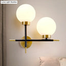 GobekUsa Post-Modern White Glass Sphere Wall Sconce with Brass Finish - 1/2 Bulbs