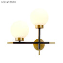 GobekUsa Post-Modern White Glass Sphere Wall Sconce with Brass Finish - 1/2 Bulbs