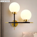 GobekUsa Post-Modern White Glass Sphere Wall Sconce with Brass Finish - 1/2 Bulbs