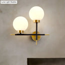 GobekUsa Post-Modern White Glass Sphere Wall Sconce with Brass Finish - 1/2 Bulbs