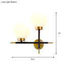 GobekUsa Post-Modern White Glass Sphere Wall Sconce with Brass Finish - 1/2 Bulbs