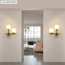 GobekUsa Post-Modern White Glass Sphere Wall Sconce with Brass Finish - 1/2 Bulbs