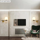 GobekUsa Post-Modern White Glass Sphere Wall Sconce with Brass Finish - 1/2 Bulbs