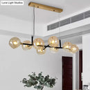 GobekUsa Postmodern Island Lighting: Amber Ball Pendant Lamp with Adjustable Cord - 8 Lights Glass